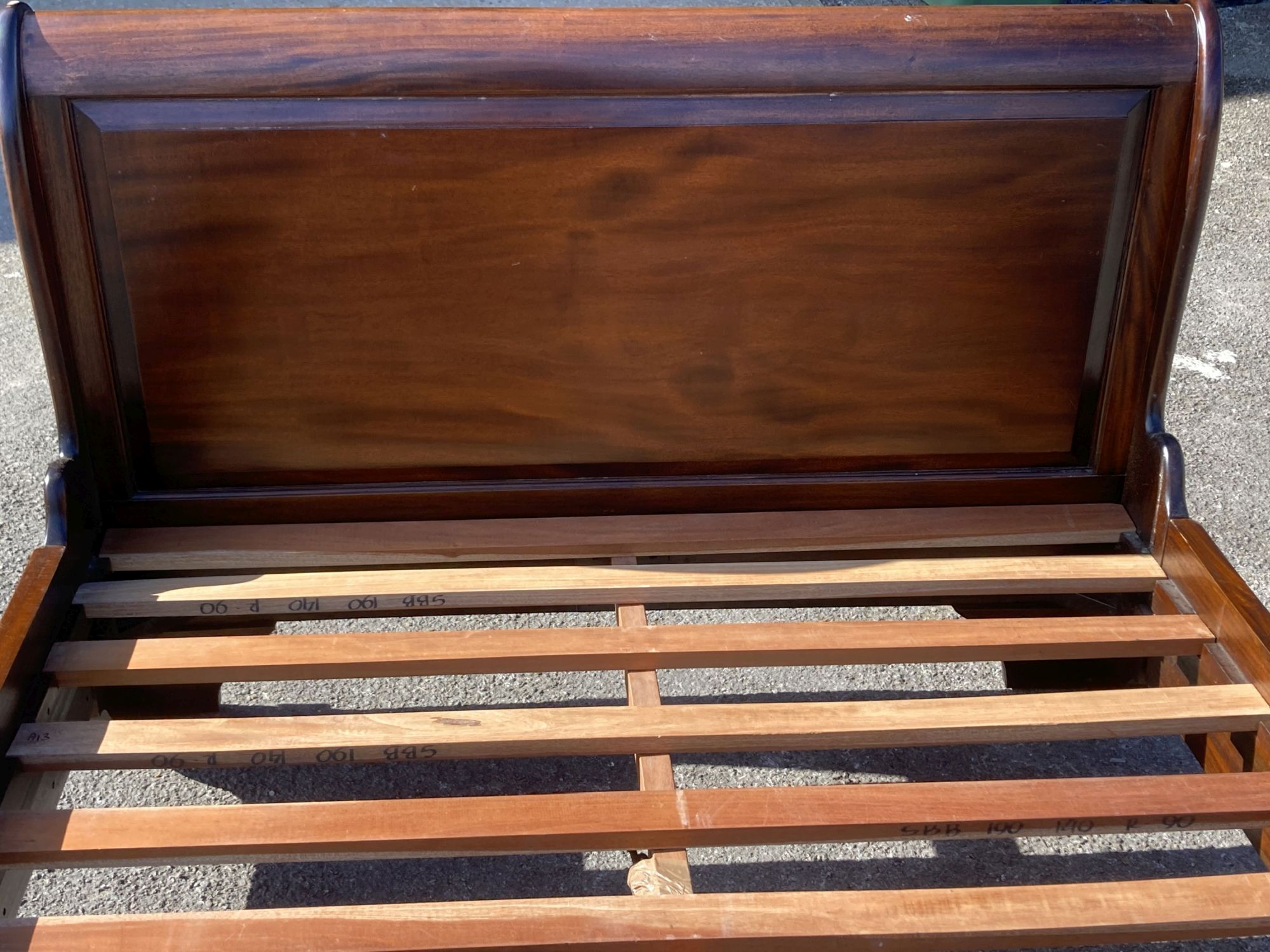 A reproduction mahogany sleigh bed, width 145cm, length 205cm